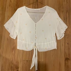 Cropped button up top with flower details